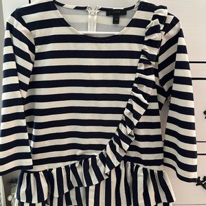 Navy blue and cream stripe peplum top, zip up the back, asymmetric ruffles
